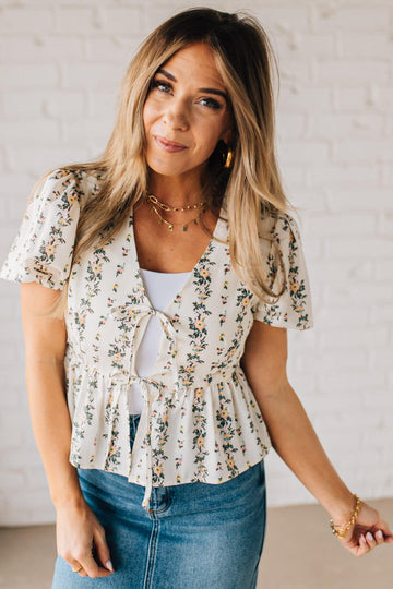 Blooming Tie Front Peplum Top