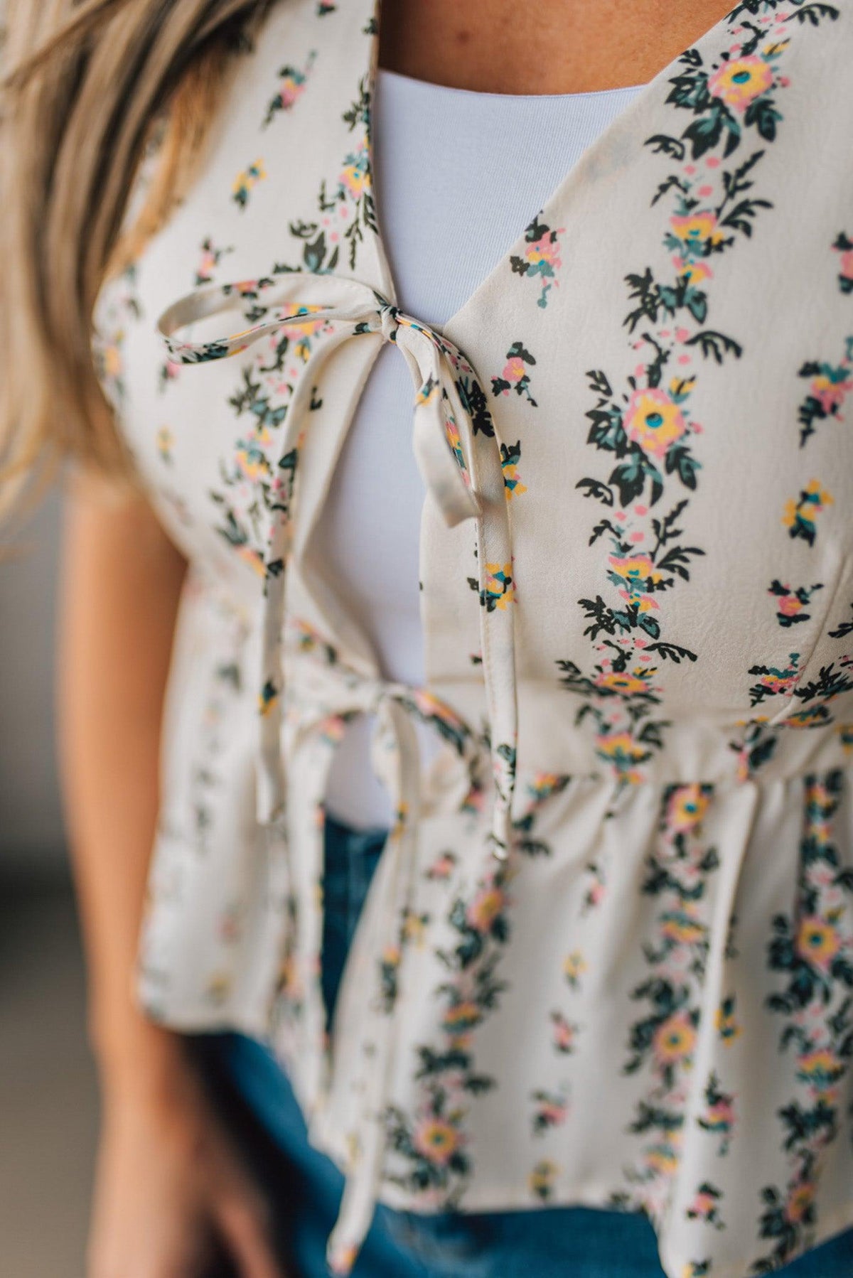 Blooming Tie Front Peplum Top